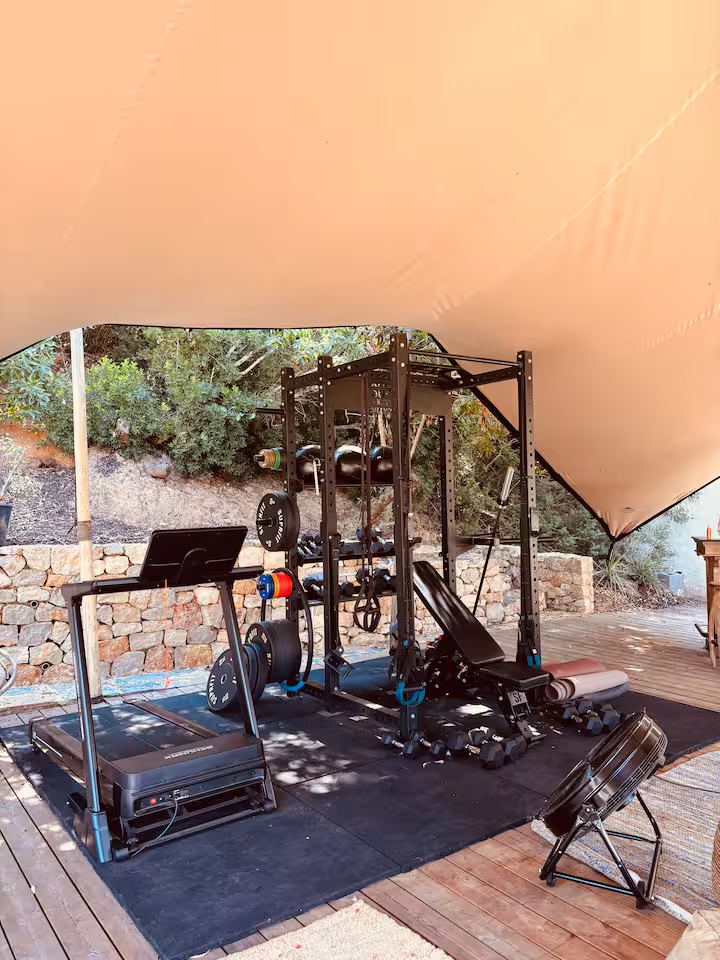 Outdoor gym under a stretch tent
